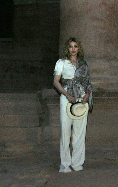 Madonna shoes offered to Gypsy charity in Romania