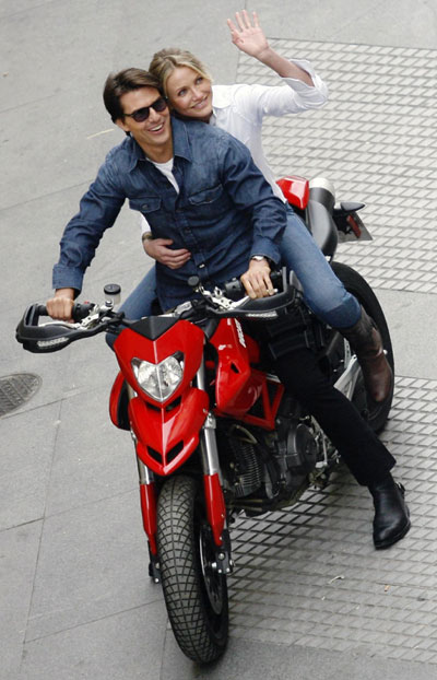 Cruise and Diaz ride motorbike during the filming of 