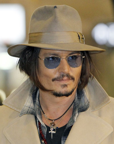 Johnny Depp attends a news conference to promote his movie 