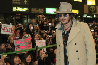 Johnny Depp attends a news conference to promote his movie 