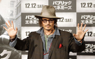 Johnny Depp attends a news conference to promote his movie 