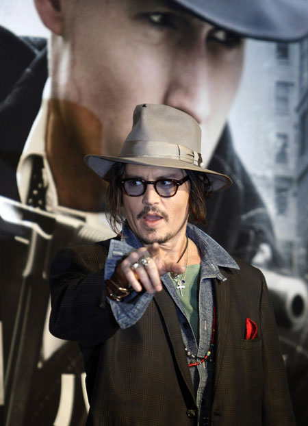 Johnny Depp attends a news conference to promote his movie 