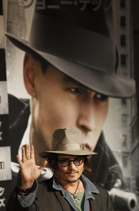 Johnny Depp attends a news conference to promote his movie 