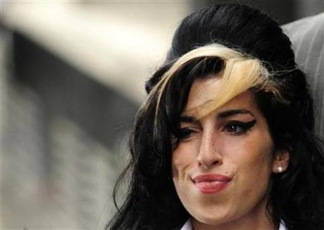 British singer Winehouse charged with assault