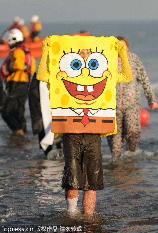 Hundreds in UK take Boxing Day dip for charity