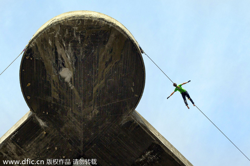 Thrill seeker enjoys hammock in the sky