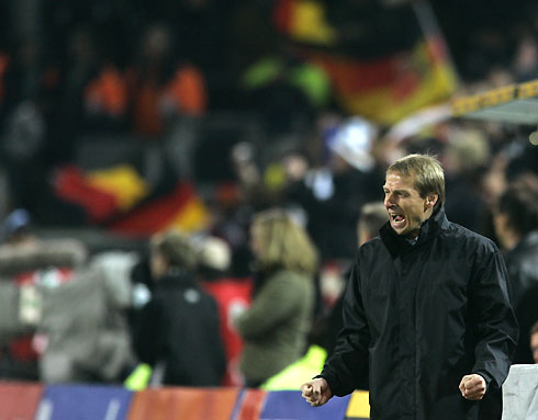 Germany's coach Juergen Klinsmann celebrates a goal against U.S. during a friendly soccer match in Dortmund March 22, 2006. [Reuters]