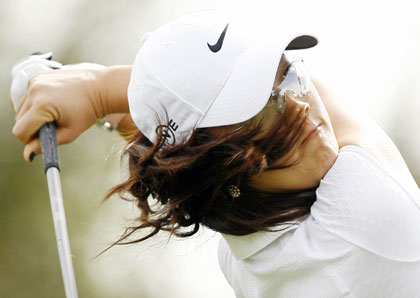 Michelle Wie of the U.S. tees off on the third hole at the LPGA Kraft Nabisco Championships golf tournament in Rancho Mirage, California March 30, 2006.