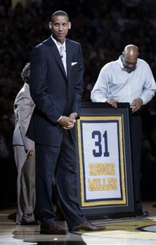 Former Indiana Pacers basketball player Reggie Miller reacts during his jersey retirement ceremony in Indianapolis, Thursday, March 30, 2006. Miller, who spent his entire career with the Pacers, later raised his jersey to the rafters. [AP]