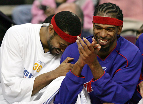 forward Rasheed Wallace (L) and guard Richard Hamilton celebrate