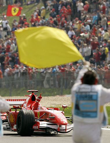 driver Michael Schumacher of Germany gestures after he wins the European Formula One Grand Prix a