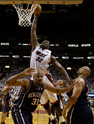 ami Heat center Shaquille O'Neal dunks the ball against 