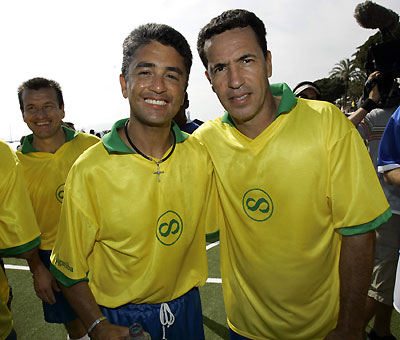 Former Brazilian World Cup winning team mates Bebeto (L) and Careca pose after the Sagatiba Football Event during the 59th Cannes Film Festival May 22, 2006. 