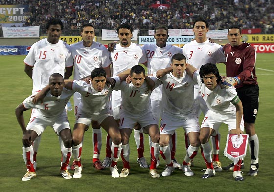 Tunisia soccer team January 24, 2006. Front row L to R: Hatem Trabelsi, Zied Jaziri, Francileudo dos Santos, Adel Chedli and Riadh Bouazizi. Back row L to R: Radhi Jaidi, Kais Ghodhbane, Sofiane Melliti, Clayton, Karim Hagui and goalkeeper Ali Boumnijel. [Reuters]