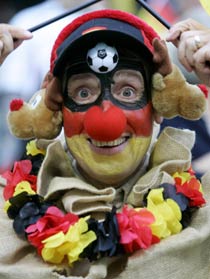 A German supporter celebrates during a friendly soccer match between Germany and Japan in Leverkusen May 30, 2006 in preparation for the FIFA World Cup Germany 2006. [Reuters]