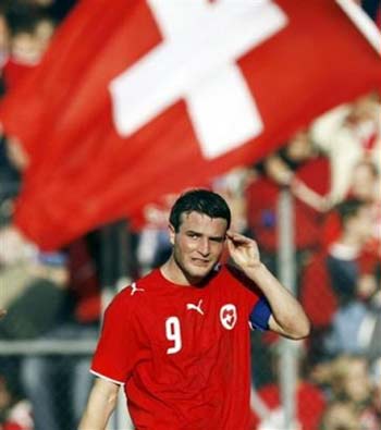 Switzerland's Alex Frei acknowledges the applause of supporters after a test match between the national soccer teams of Switzerland and China, in Zurich, Switzerland, Saturday, June 3, 2006, ahead of the World Cup in Gemany. Switzerland will play in group G with France, Togo and South Korea. China is not qualified for the World Cup. Switzerland won the test match 4-1. (AP Photo