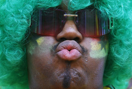 A fan of Ghana waits for the start of the Group E World Cup 2006 soccer match between Ghana and Italy in Hanover June 12, 2006. 