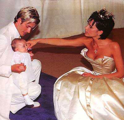 Beckham and wife Victoria, son Brooklyn at wedding