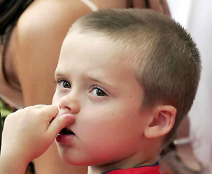 Victoria Beckham and son Cruz, Romeo and Brooklyn.