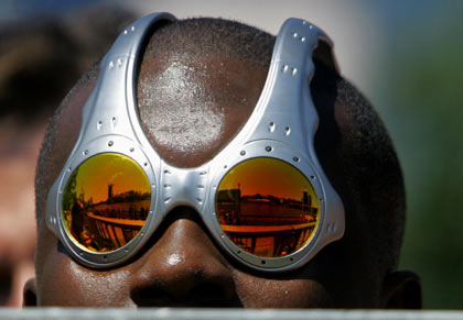 A soccer fan watches the World Cup soccer match between Australia and Japan in a so-called 'fan festival' in Frankfurt, June 12, 2006.