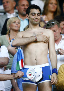 An Italy fan gestures in the stands before the Group E World Cup 2006 soccer match between Italy and the U.S. in Kaiserslautern June 17, 2006. 
