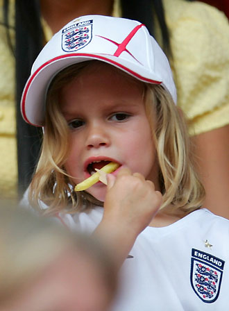 Romeo Beckham, son of England's David Beckham and his wife Victoria, waits in the stands before Trinidad and Tobago's Group B World Cup 2006 soccer match against England in Nuremberg June 15, 2006.