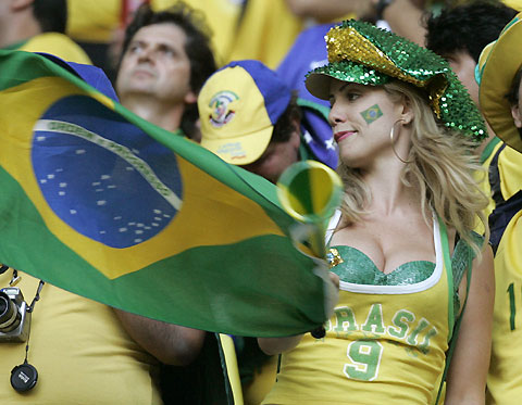 A Brazil fan celebrates in the stands after their Group F World Cup 2006 soccer match against Australia in Munich June 18, 2006. 