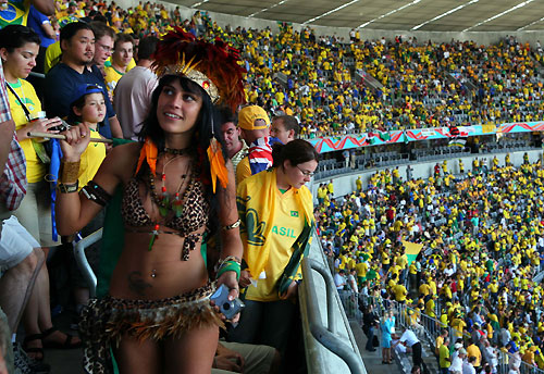A Brazil fan celebrates in the stands after their Group F World Cup 2006 soccer match against Australia in Munich June 18, 2006. 
