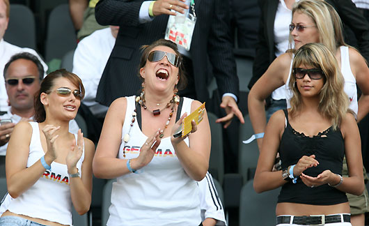 Wives and girlfriends of German soccer players wait in the stands before Germany's Group A World Cup 2006 soccer match against Ecuador in Berlin June 20, 2006. [Reuters]