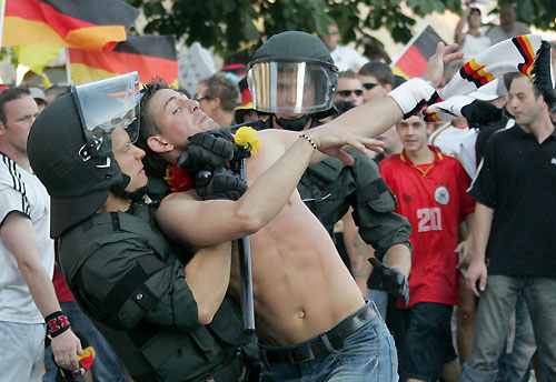 England and Germany soccer fans clash in Stuttgart city centre during the World Cup tournament June 24, 2006. [Reuters]