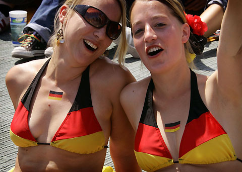 Soccer fans of Germany cheer in the centre of Stuttgart while waiting for a screening of Germany playing Sweden in the second round soccer World Cup 2006, June 24, 2006.