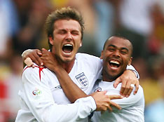 England's David Beckham celebrates his goal against Ecuador with ashley Cole 