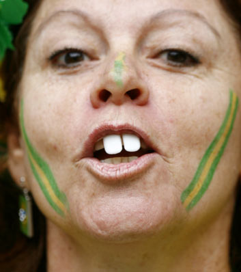 A fan waits for the start of the second round World Cup 2006 soccer match between Brazil and Ghana in Dortmund June 27, 2006. 
