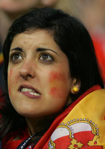 A Spain soccer fan reacts at a fan-festival in Hanover as France wins their World Cup 2006 match against Spain June 27, 2006.