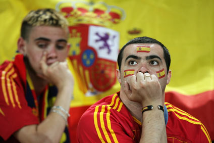 Spain fans react after their team's loss to France at the second round World Cup 2006 soccer match in Hanover June 27, 2006.