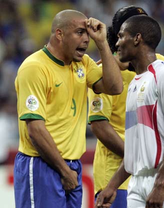 Brazil's Ronaldo (9) reacts before a yellow card is given to him during the World Cup 2006 quarter-final soccer match between Brazil and France in Frankfurt July 1, 2006.