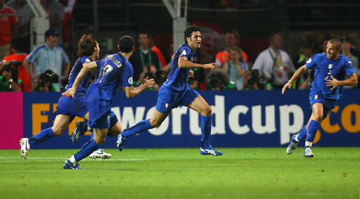 Italy's Alessandro Del Piero (L) scores past Germany's Jens Lehmann for his team's second goal during their World Cup 2006 semi-final soccer match in Dortmund July 4, 2006. 