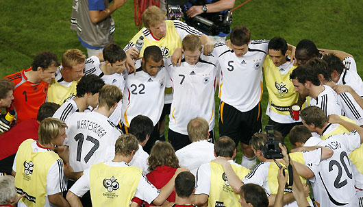 Italy's Fabio Cannavaro challenges Germany's Miroslav Klose (11) for the ball during their World Cup 2006 semi-final soccer match in Dortmund July 4, 2006.