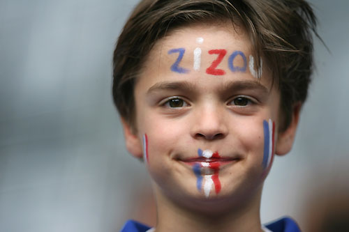 A fan waits in the stands before the World Cup 2006 semi-final soccer match between Portugal and France in Munich July 5, 2006. 