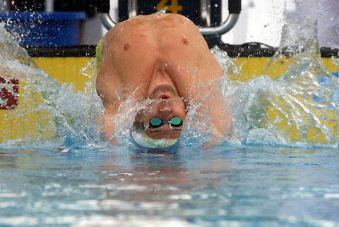 Austria's Markus Rogan competes the men's 100 metres backstroke heat during European Aquatic Championships in Budapest, Hungary 