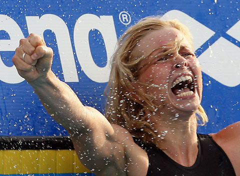 Britta Steffen of Germany celebrates her victory in the women's 100m freestyle final during the European Aquatic Championships in Budapest August 2, 2006.