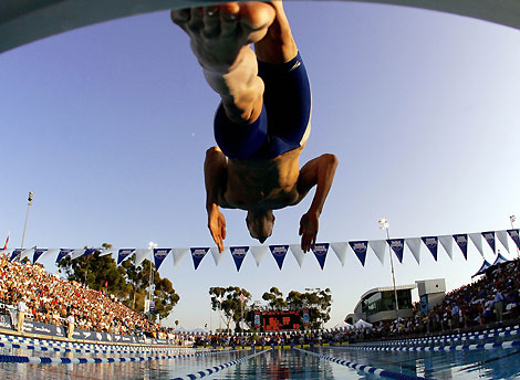 Michael Phelps of the U.S. dives in on his way to a win in the men's 200m freestyle final during the USA Swimming National Championships in Irvine, California, August 2, 2006.