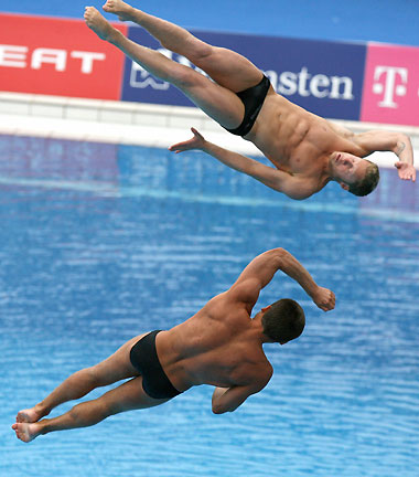 Silver medallists Italy's Nicoala and Tommaso Marconi compete in the final of the men's 3m synchronised springboard diving competition during the European Aquatic Championships in Budapest, Hungary August 3, 2006.