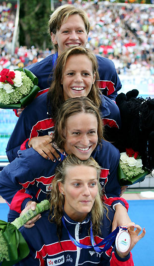 France's women's 4 x 100m medley relay team (from top) Alena Popchanka, Laure Manaudou, Anne-Sophie
