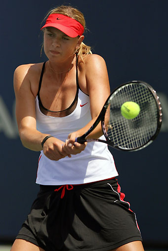 Russia's Maria Sharapova reacts after defeating Kim Clijsters of Belgium in the final of the Acura Classic women's tennis tournament in Carlsbad, California August 6, 2006.