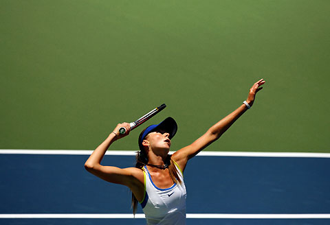Daniela Hantuchova of Slovakia serves to Lisa Raymond of the U.S. during the JPMorgan Chase Open women's tennis tournament in Carson, California, August 9, 2006. 