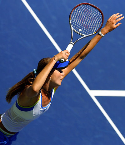 Daniela Hantuchova of Slovakia serves to Lisa Raymond of the U.S. during the JPMorgan Chase Open women's tennis tournament in Carson, California August 9, 2006. 