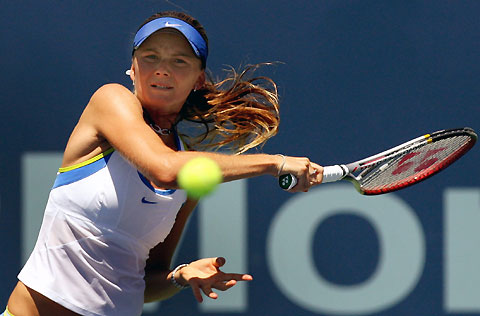 Daniela Hantuchova of Slovakia hits a forehand to Lisa Raymond of the U.S. during the JPMorgan Chase Open women's tennis tournament in Carson, California, August 9, 2006. 