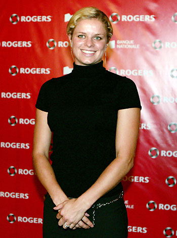 Kim Clijsters of Belgium arrives for a fashion show during the second day at the Sony Ericsson WTA Tour in Montreal, Canada, August 13, 2006. 