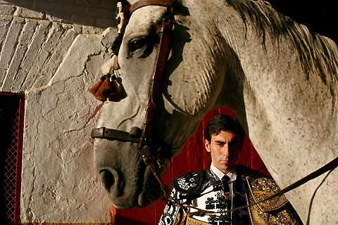 Spanish bullfighter Fernando Cruz waits to start a bullfight at the Maestranza bullring in Seville August 15, 2006. 